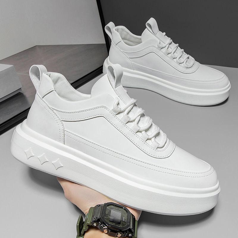 Side profile showing the trainers' low-top design