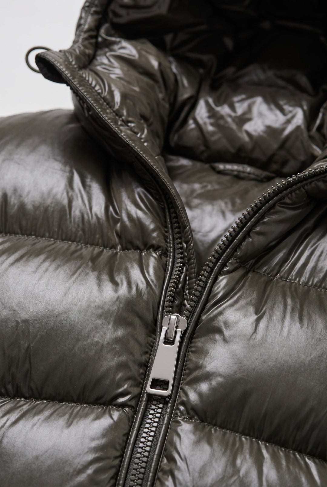 Close-up of the hood and quilted construction on a men's jacket