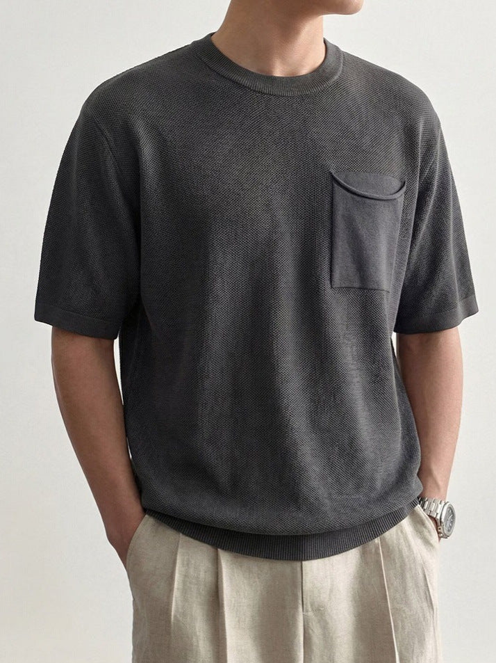 Detail of the crew neck and textured finish on the men's polo