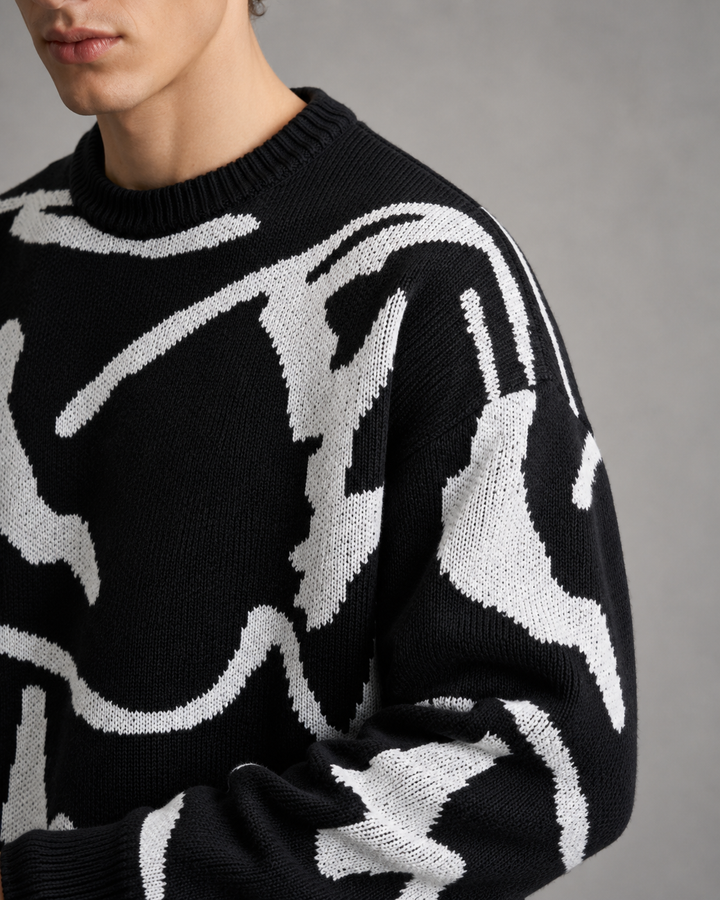 Abstract graphic detail on a men's knitted sweater