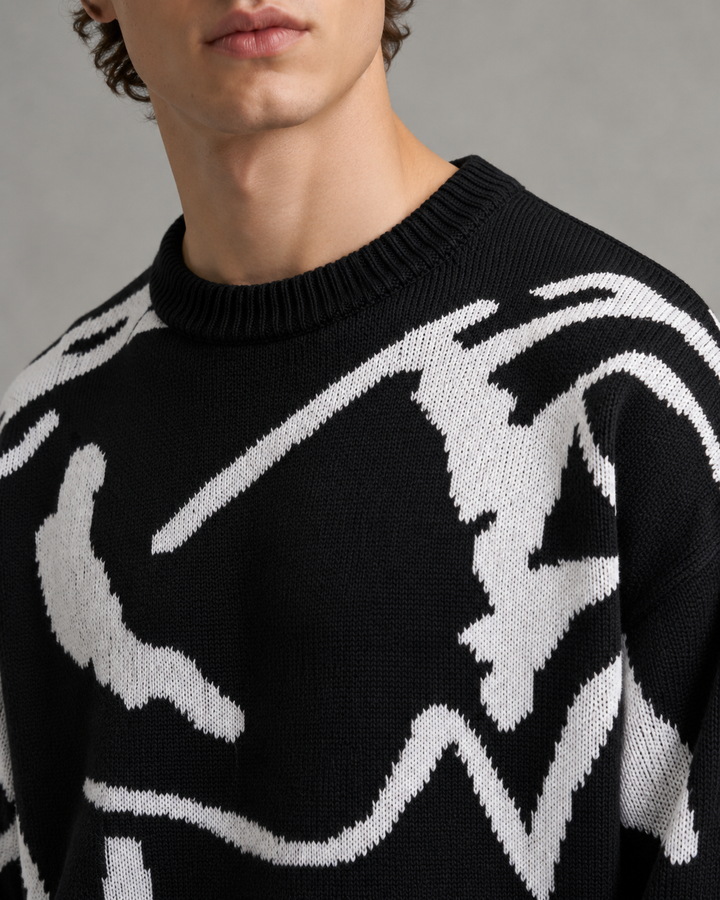 Men's sweater showing the relaxed drop shoulder fit
