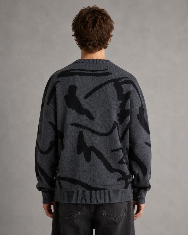 Side view of the men's relaxed fit knit sweater