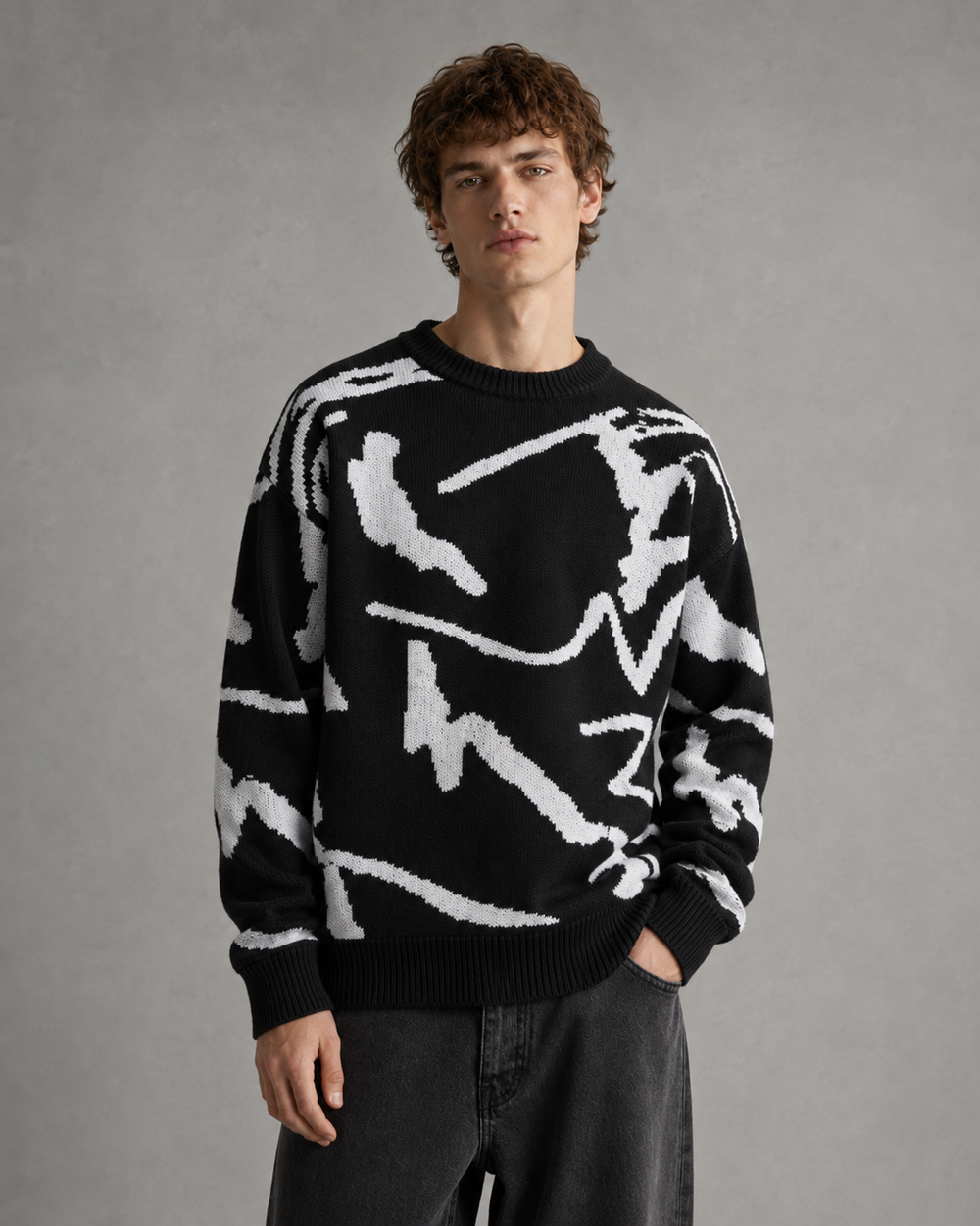 Front view of a men's graphic knit sweater
