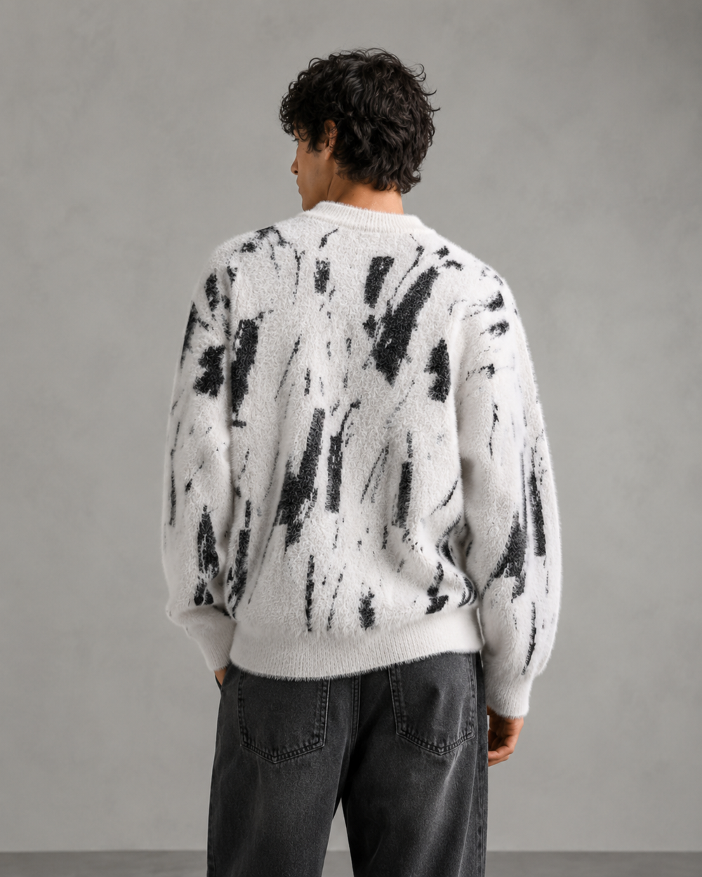 Front view of a men's abstract textured knit jumper