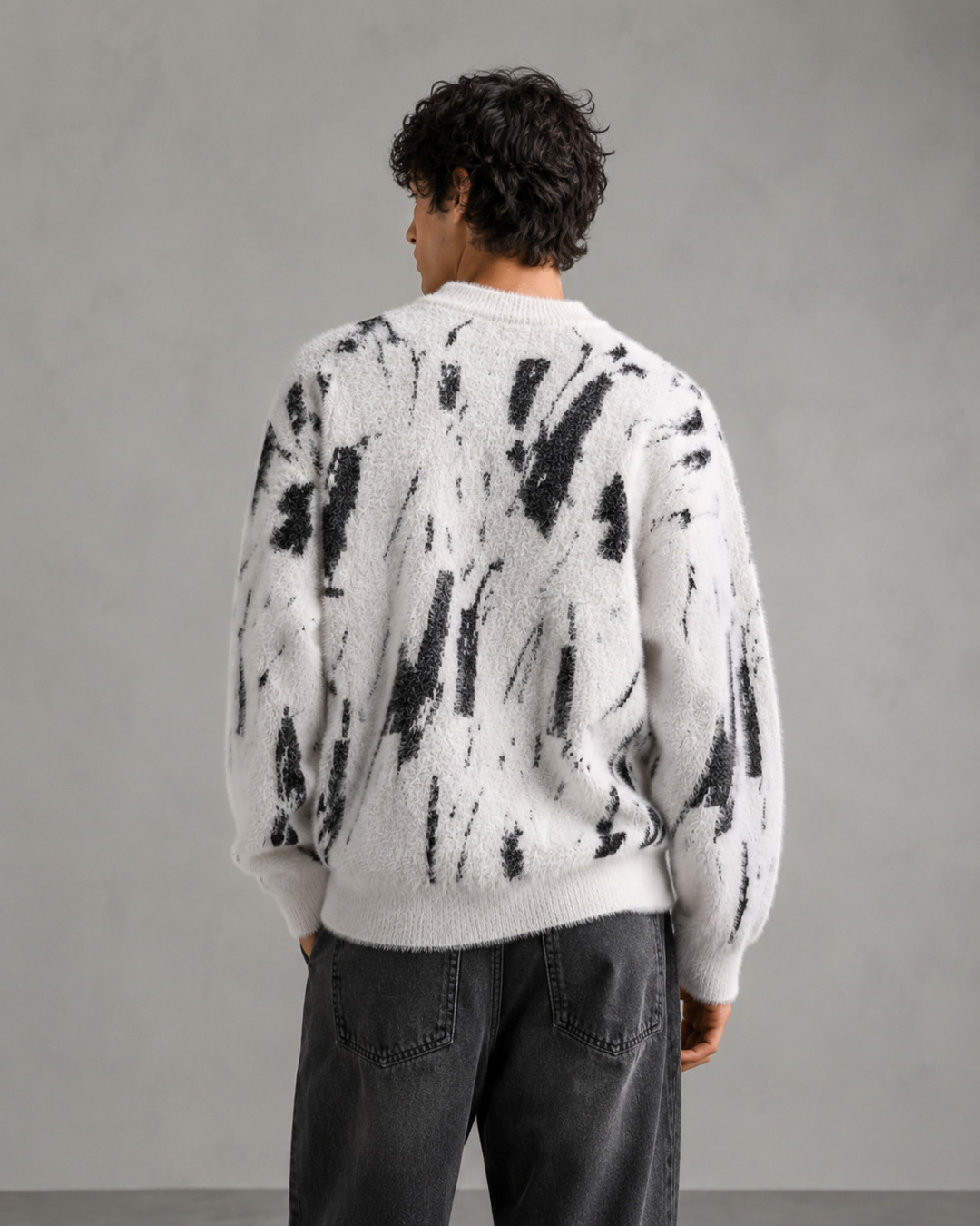 Front view of a men's abstract textured knit jumper