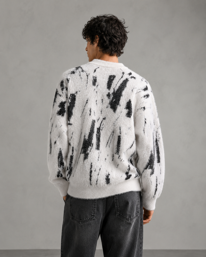 Front view of a men's abstract textured knit jumper