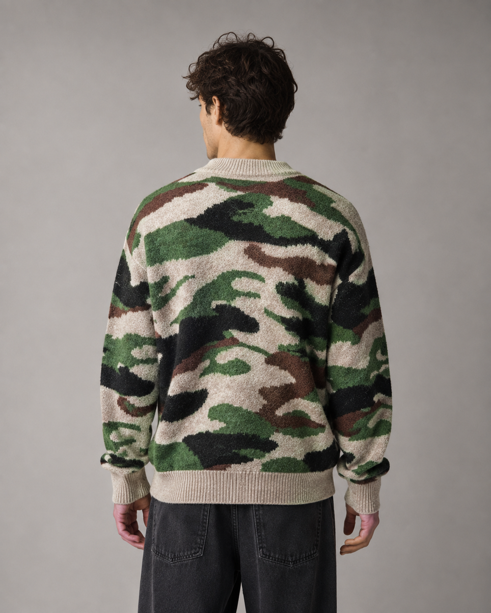 Men's camouflage jumper shown from the back in a relaxed streetwear fit