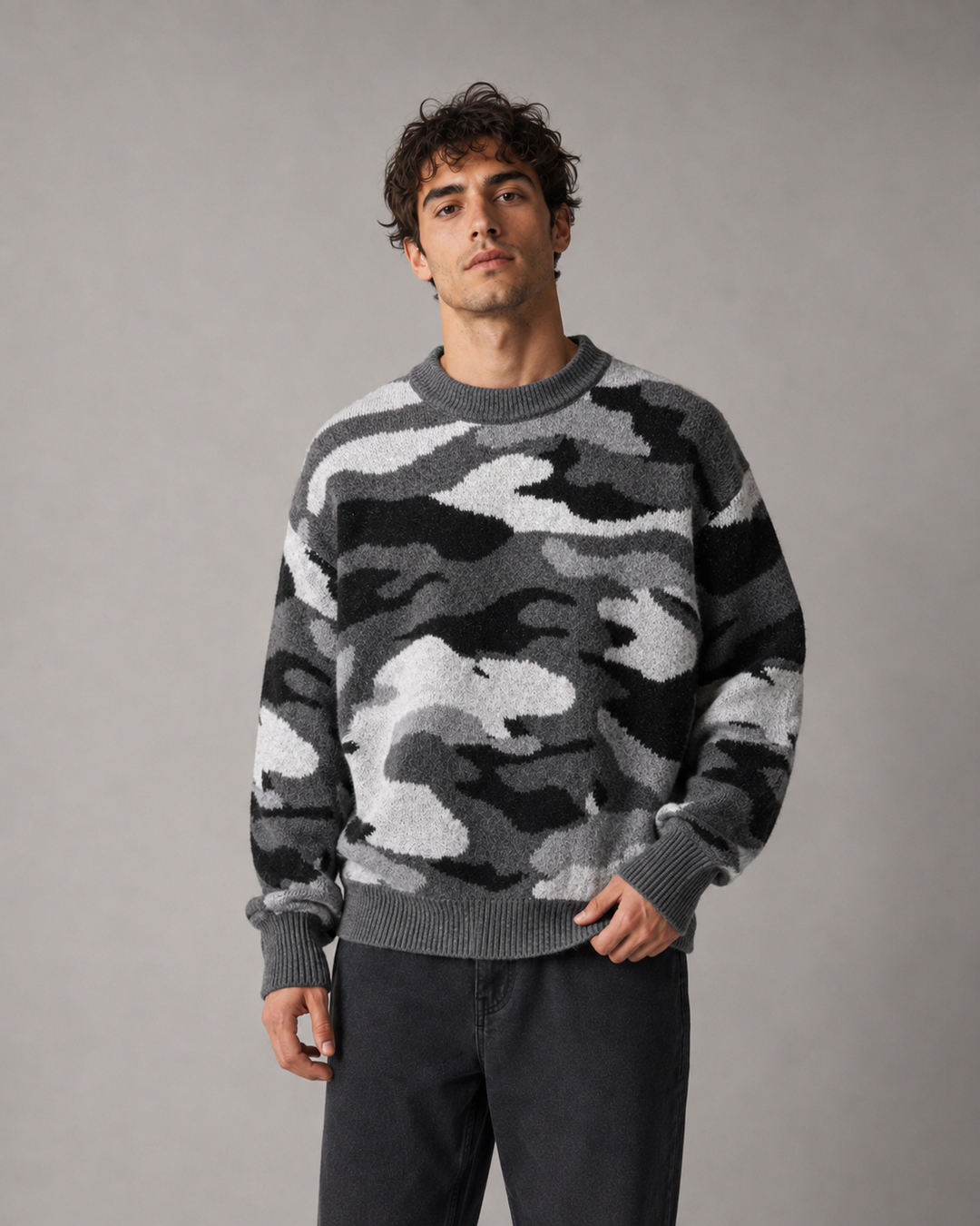 Detail of the crew neck and textured knit on the men's camouflage jumper