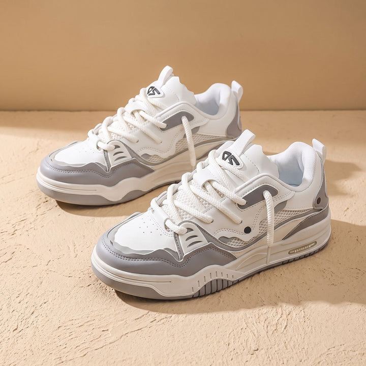 Pair of men's chunky low-top sneakers shown together