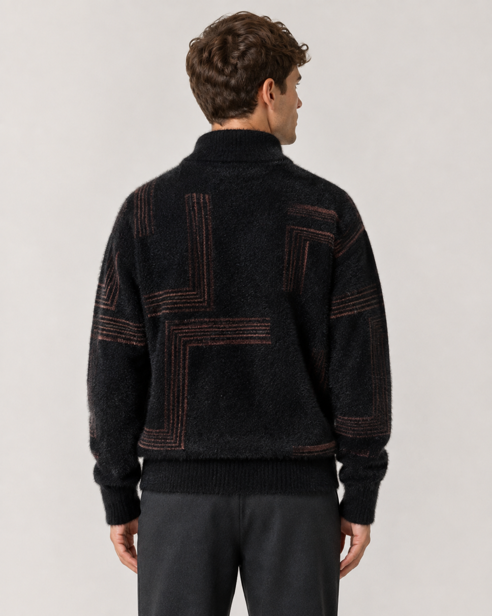 Men's brushed knit jumper showing the funnel neck and relaxed fit
