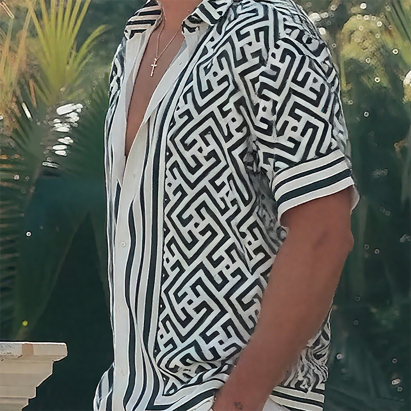 Close-up of geometric print fabric and lapel collar on men's shirt