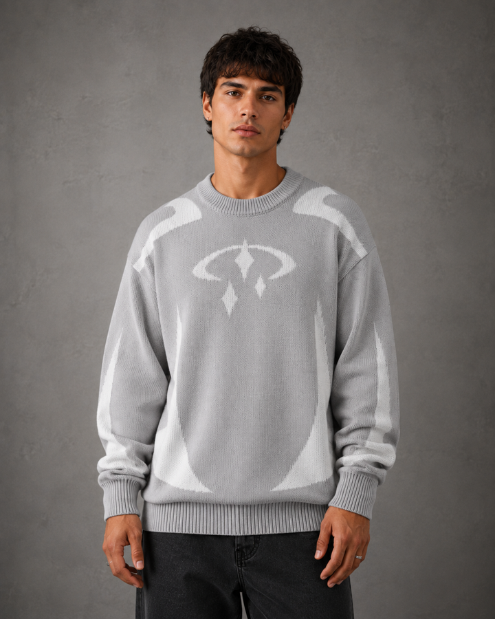 Men's graphic knit jumper shown as an everyday layering piece