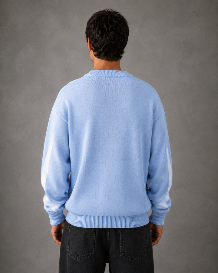 Close-up view of the graphic knit design on the men's jumper