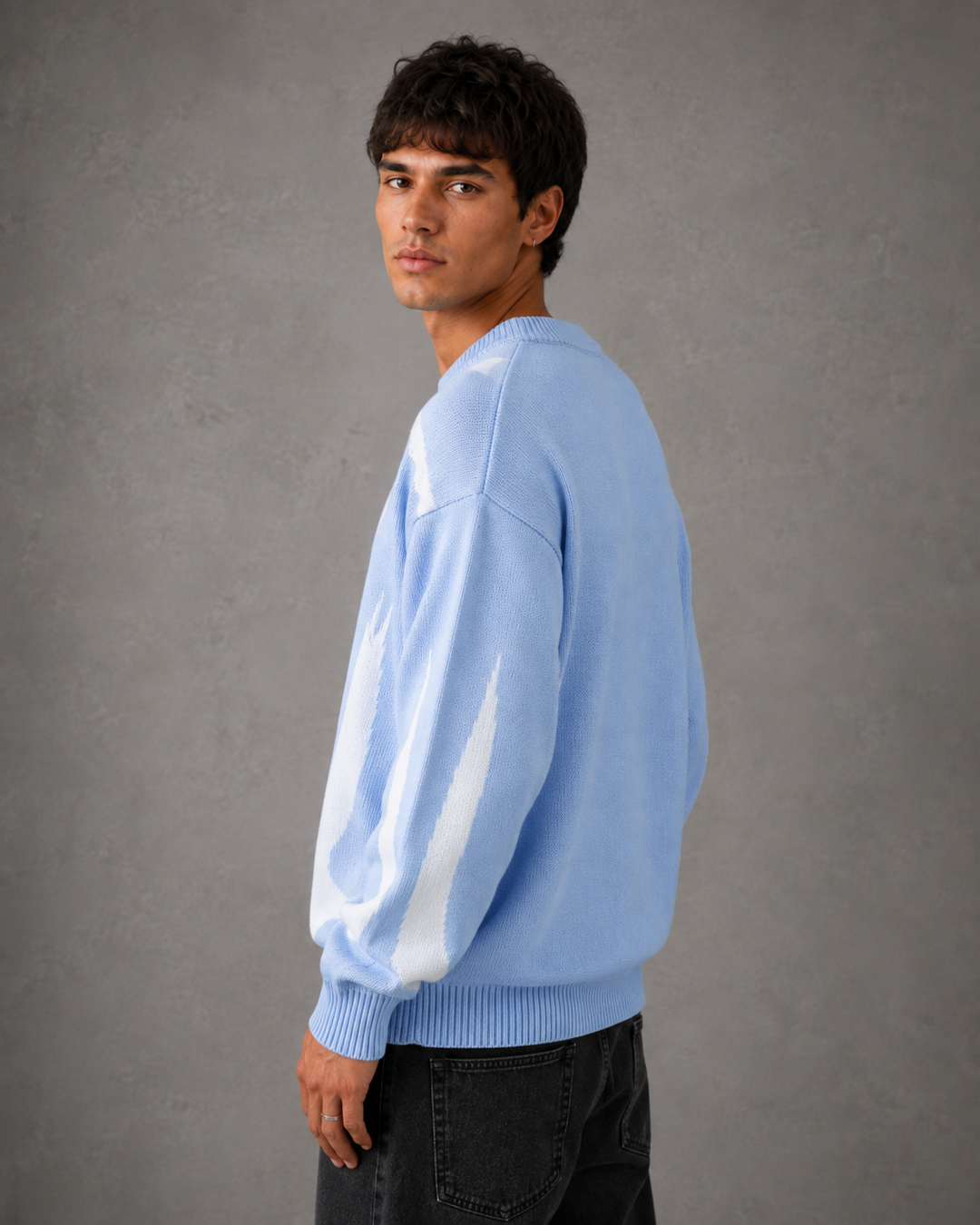 Men's jumper showing the relaxed crew neck and long sleeves