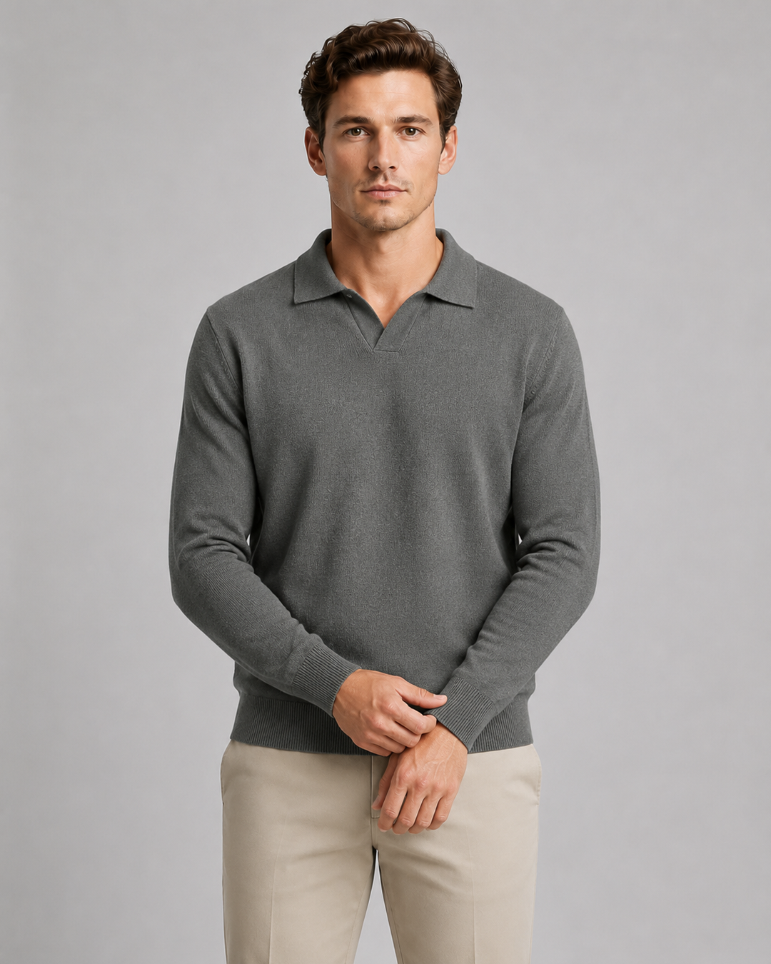 Detail of the open collar on a men's knitted polo