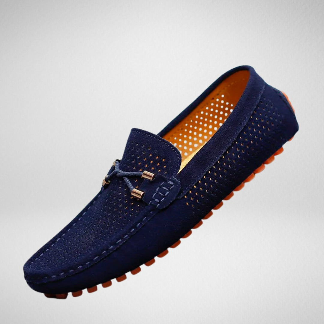 Men's perforated suede slip-on loafers shown from the front