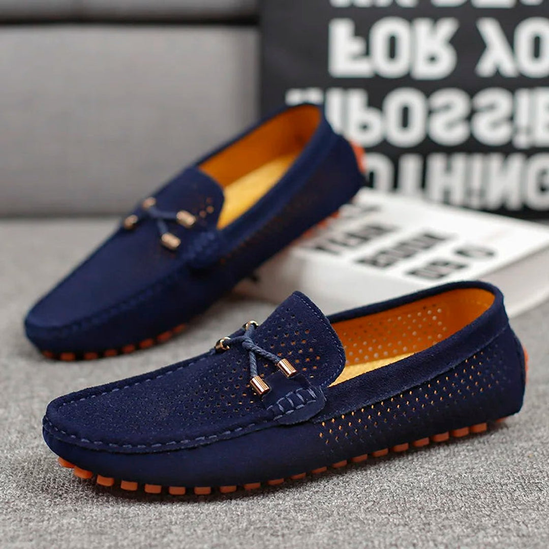Pair of men's perforated suede slip-on loafers