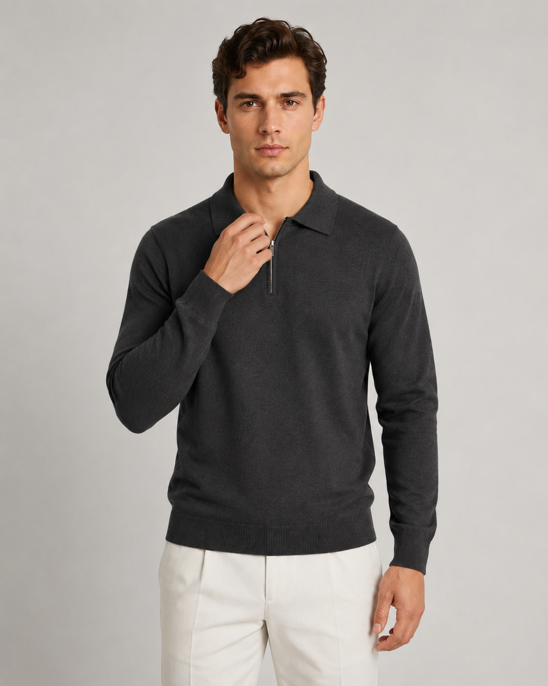 Men's polo sweater showing the ribbed cuffs and hem
