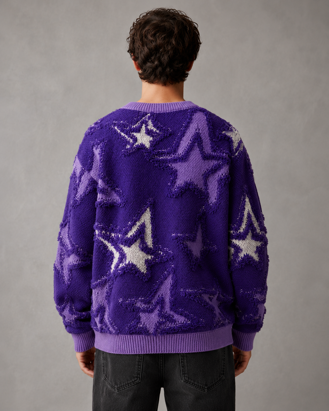 Men's relaxed-fit jumper showing the star knit pattern