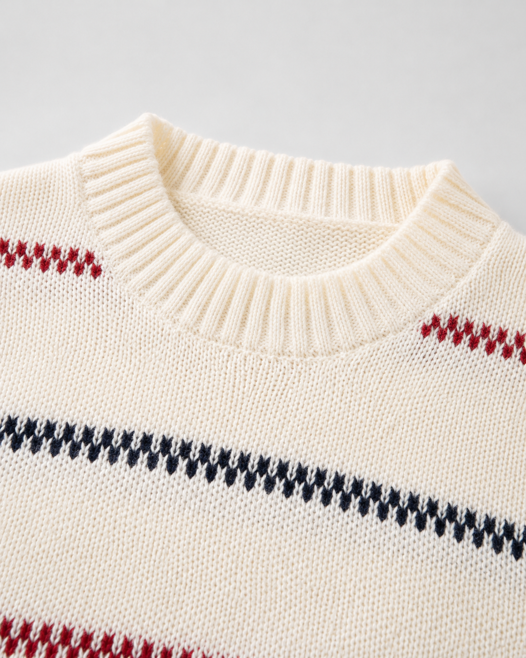 Side view of a relaxed-fit men's knit jumper