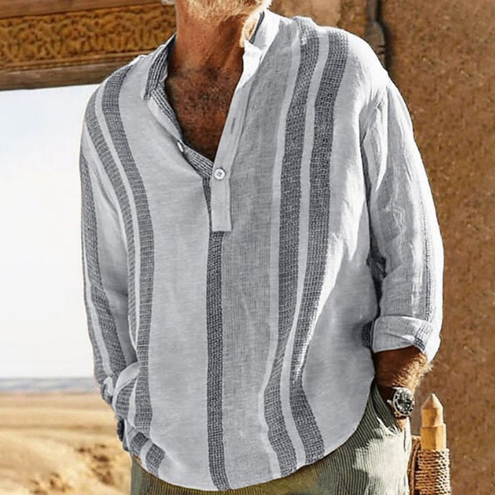 Men's long sleeve striped shirt showing cuff and sleeve detail