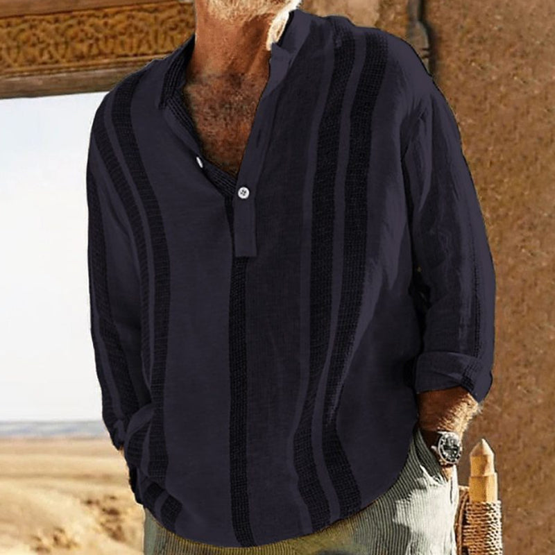 Men's striped V neck long sleeve shirt styled on a model
