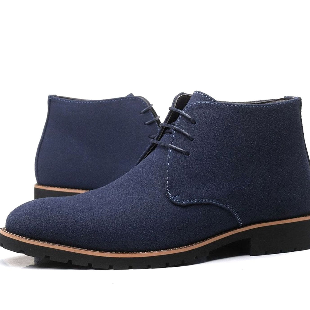Side view of men's suede chukka ankle boots showing the ankle-height design