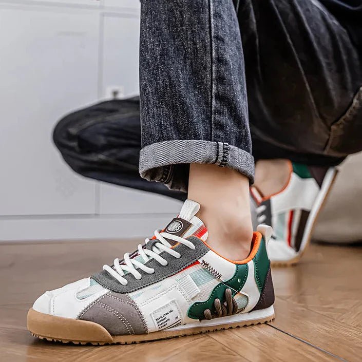 Close-up of layered suede and mesh detailing on trail sneakers