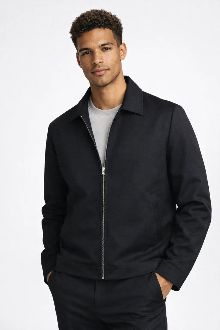 Side view showing the longline fit of a padded women's coat