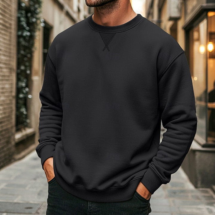 Detail of the sweatshirt fabric and crew neckline