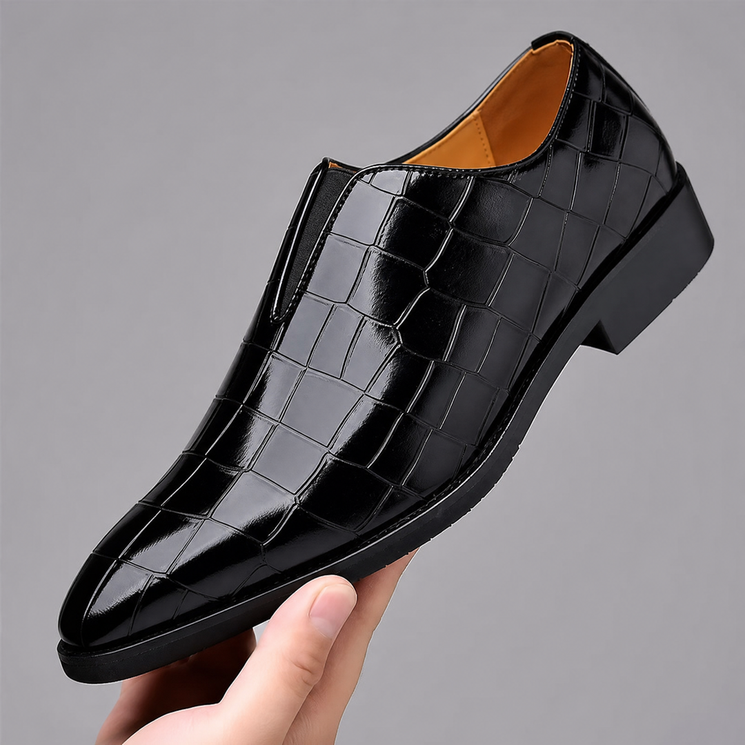 Top and side view of croc-embossed men's loafers