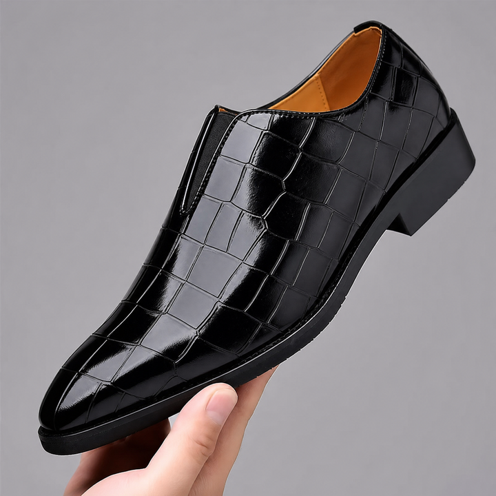 Top and side view of croc-embossed men's loafers