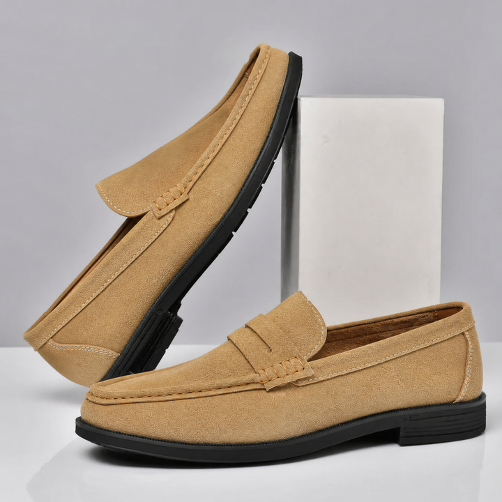 Sole and heel detail of men's suede penny loafers