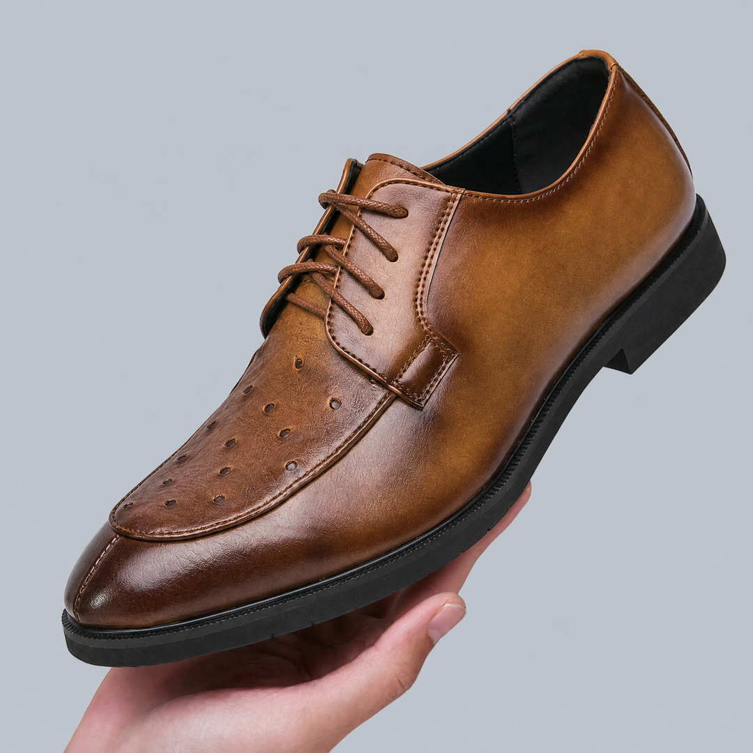 Men's ostrich leather dress shoes displayed as a matching pair