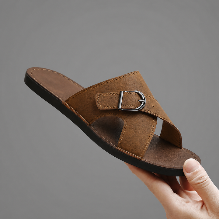 Pair of men's nubuck leather cross strap sandals displayed together