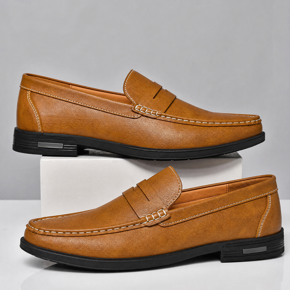 Pair of men's leather penny loafers viewed from above