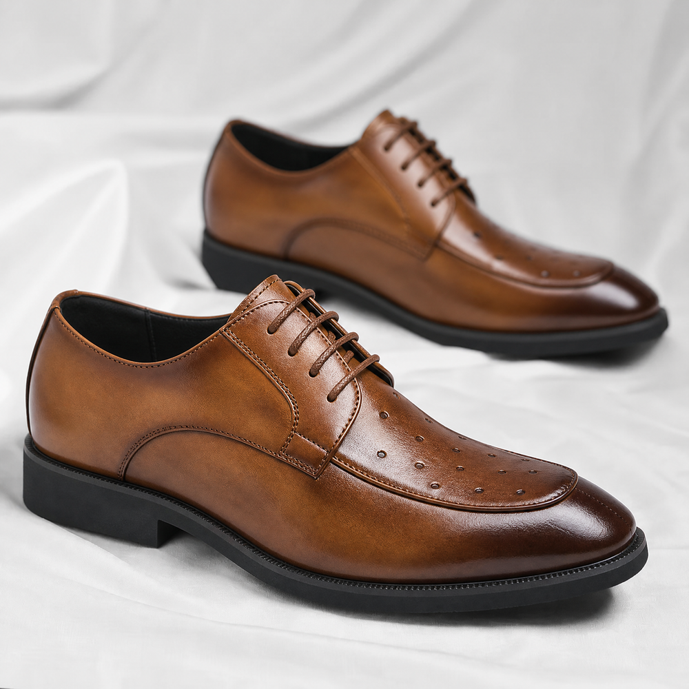 Pair of men's ostrich leather dress shoes from a front angle