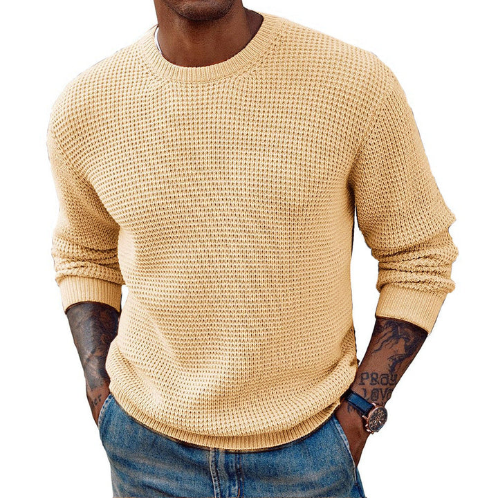 Side view showing the relaxed longline fit of the men's jumper