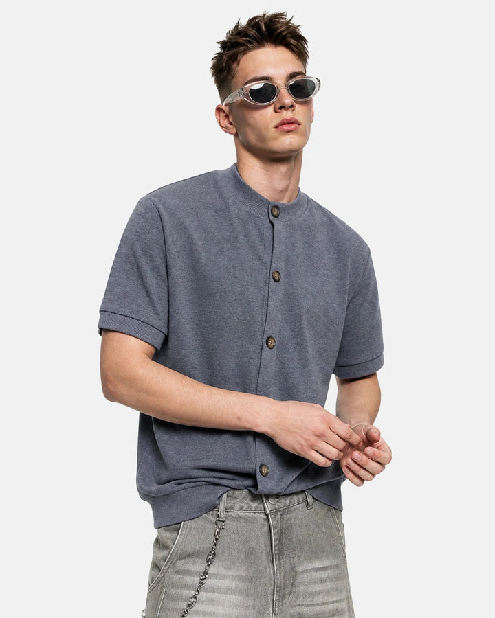 Detail of the collar and neckline on the men's knit cardigan