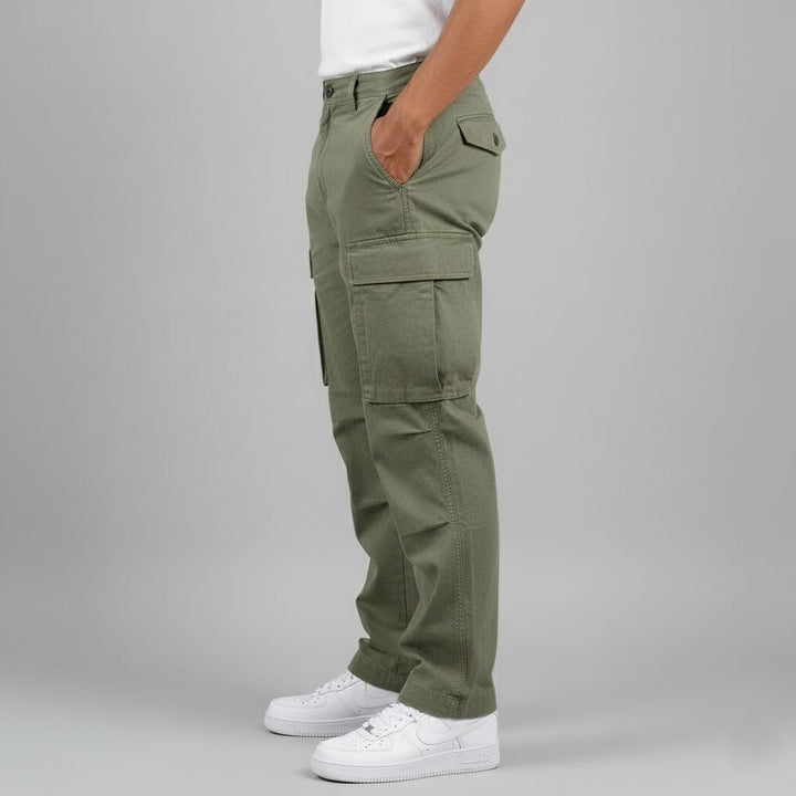 Men's tapered cargo trousers styled on a model, full length
