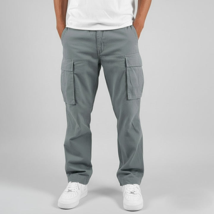 Fabric texture detail of men's tapered cargo trousers