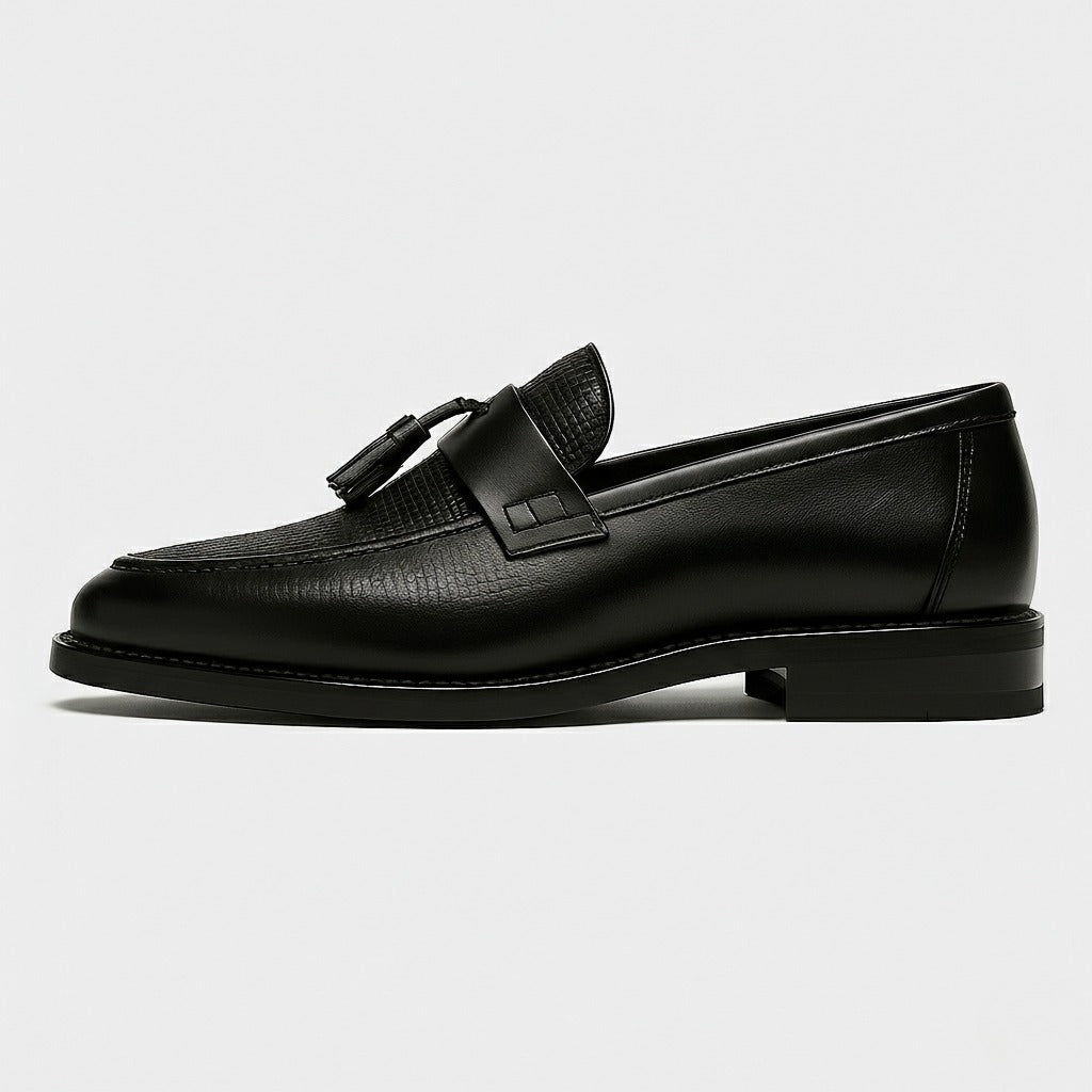 Close-up of men's tassel dress loafers highlighting the rounded toe detail