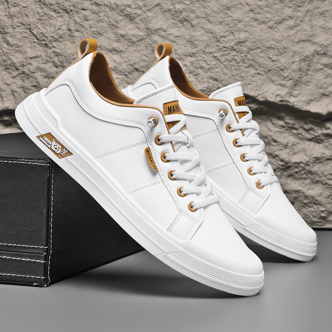 Men's leather low top trainers shown from the side