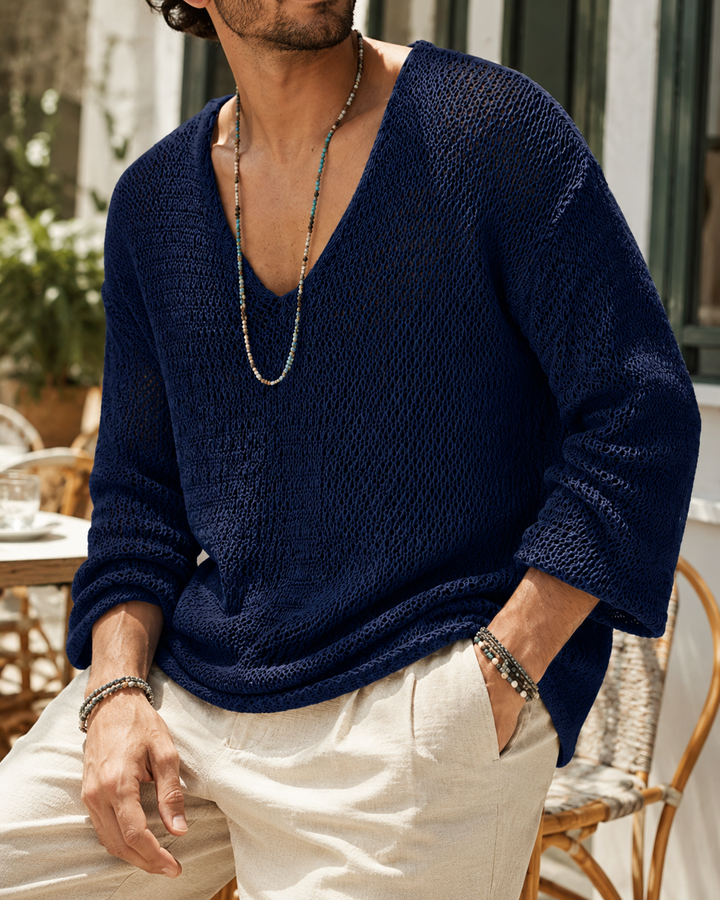 Men's relaxed fit knitted pullover styled on a model for a smart-casual look