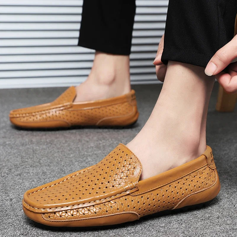 Underside of a men's loafer showing the textured outsole
